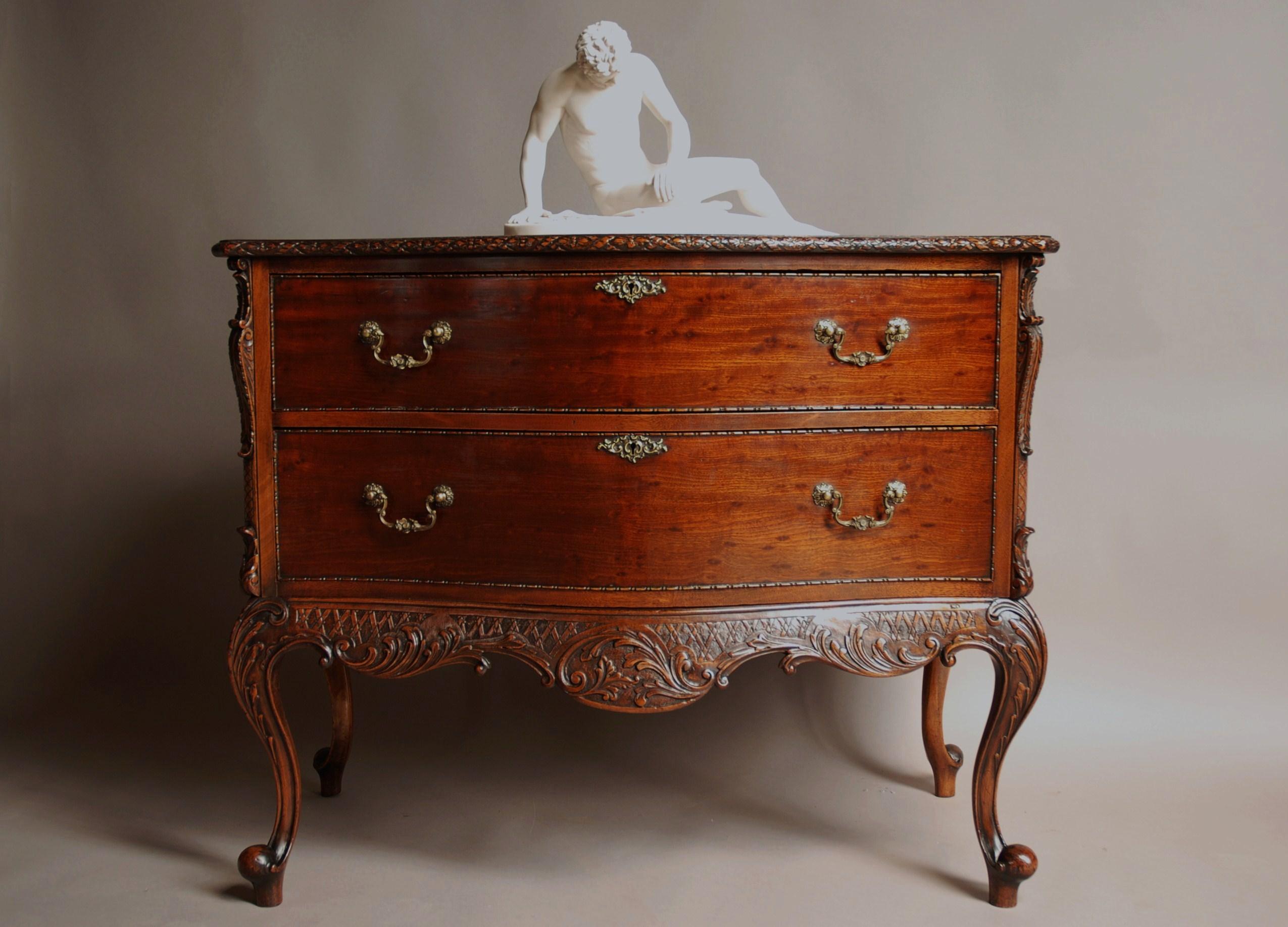 Fine quality Chippendale revival mahogany commode of serpentine form....
