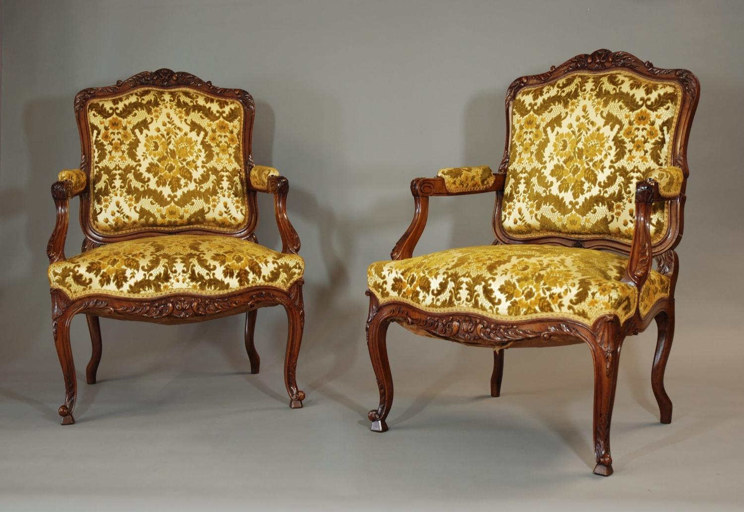 Pair of French late 19thc walnut fauteuils