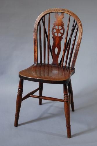 Set of four 19thc wheelback windsor chairs
