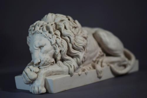 Pair of composition 20thc lions