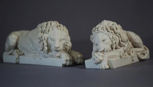 Pair of composition 20thc lions