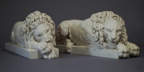 Pair of composition 20thc lions