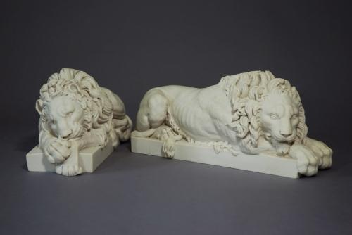 Pair of composition 20thc lions