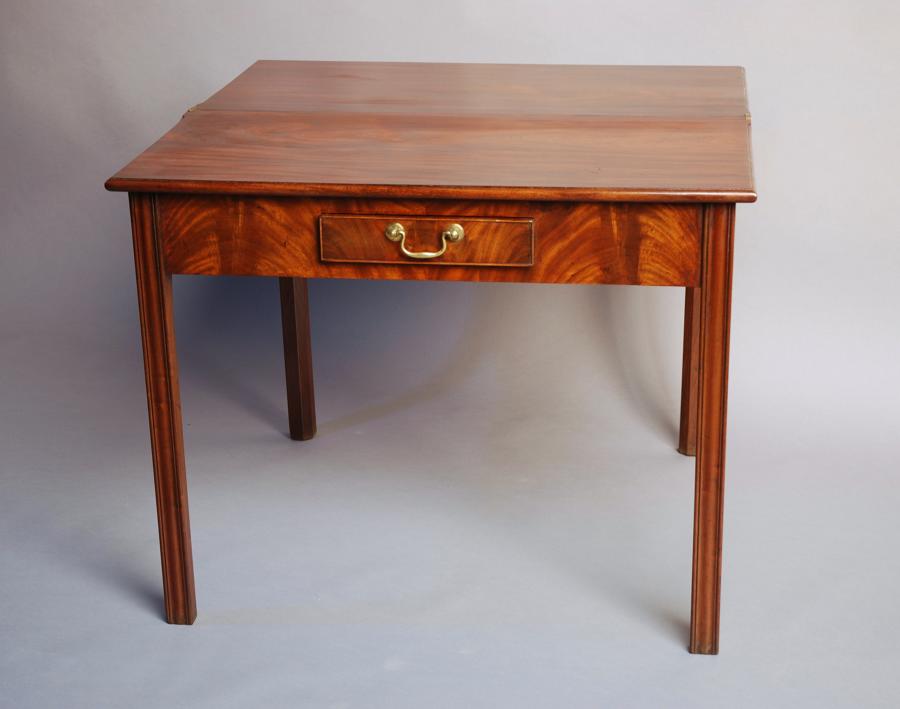 Mid 18thc mahogany tea table of good patina