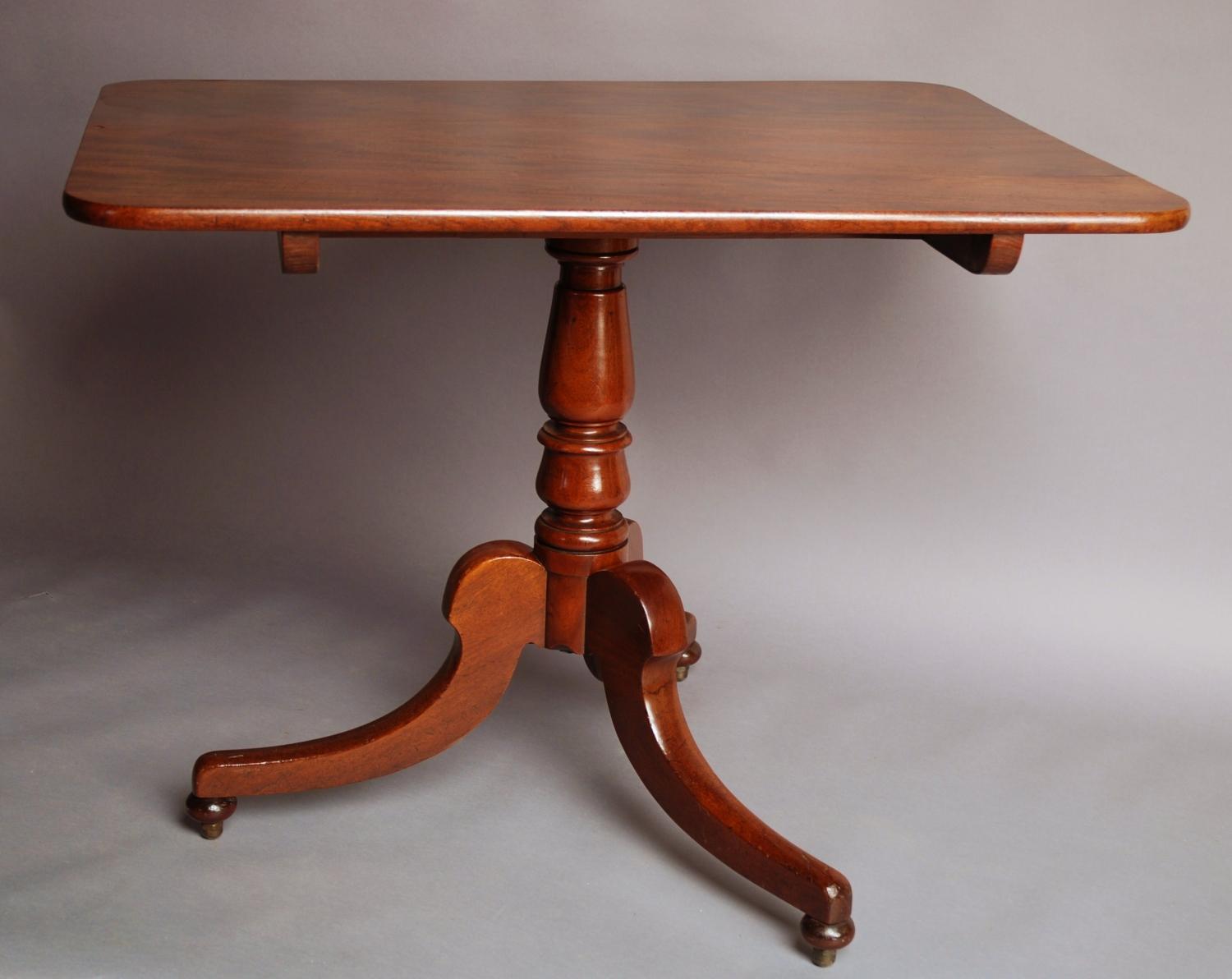 Mid 19thc mahogany tilt top dining table 
