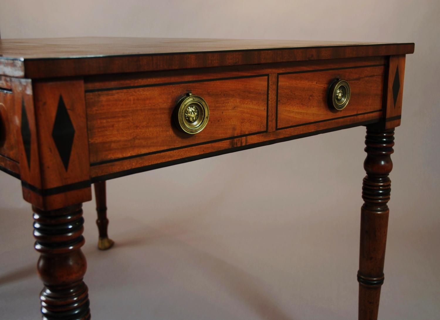 Regency two drawer mahogany writing table