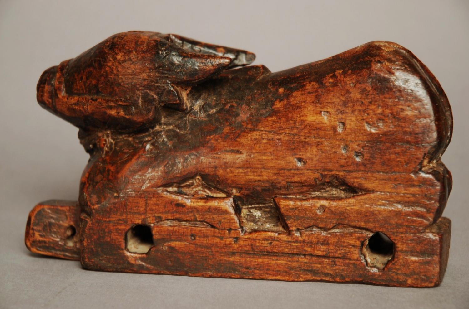 Wooden childs toy of a calf