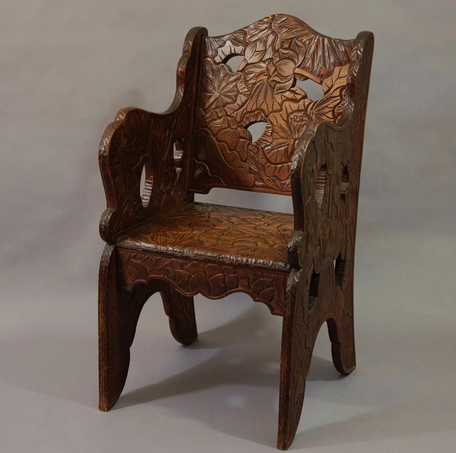 Early 20thc carved walnut armchair