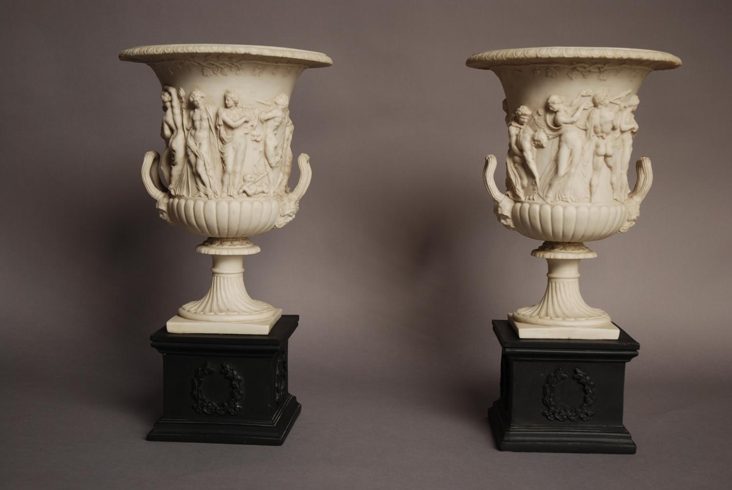 Pair of highly decorative classical urns