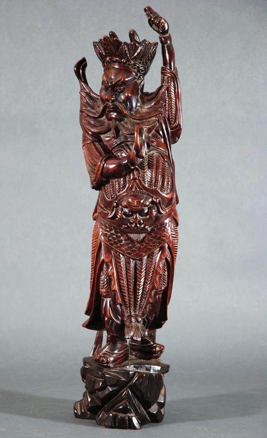 Chinese carving of mortal with headdress
