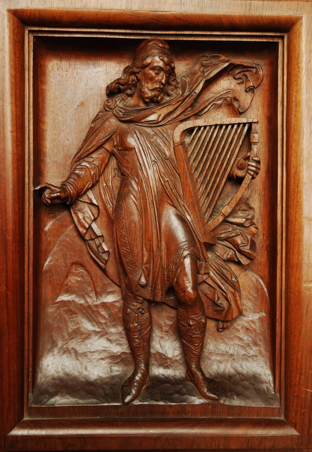 19thc carved walnut panel of Medieval man