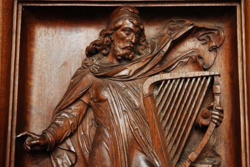 19thc carved walnut panel of Medieval man