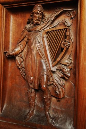 19thc carved walnut panel of Medieval man