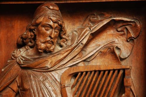 19thc carved walnut panel of Medieval man
