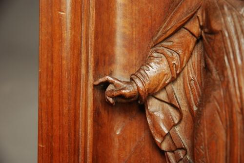 19thc carved walnut panel of Medieval man