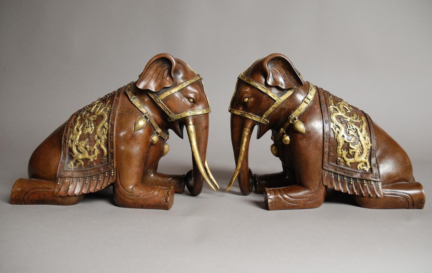 Pair of Chinese bronze & gilt elephants
