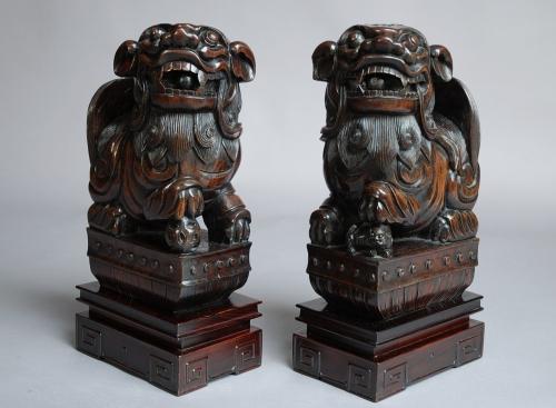Pair of Chinese hardwood Fu Lions