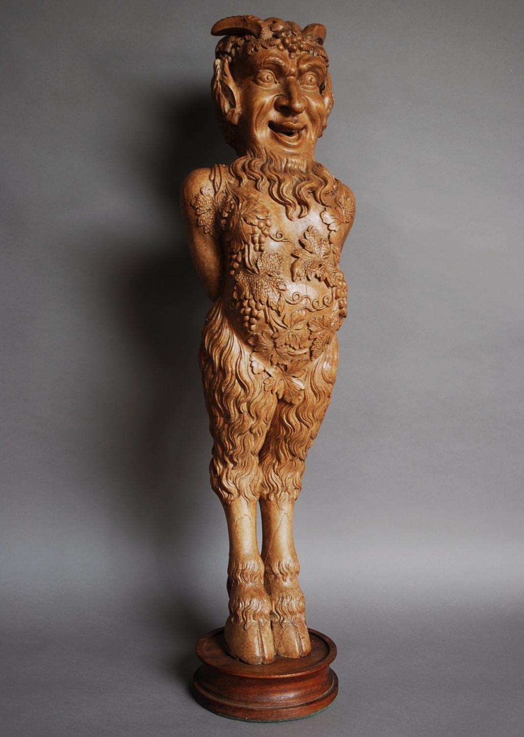 Large Continental carved satyr figure