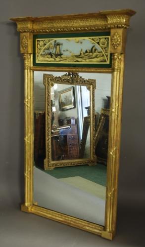 Regency style eglomise giltwood pier mirror