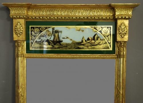 Regency style eglomise giltwood pier mirror