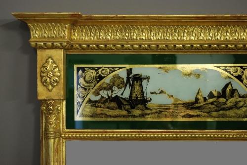 Regency style eglomise giltwood pier mirror