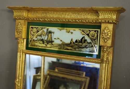 Regency style eglomise giltwood pier mirror