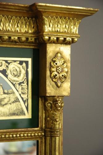 Regency style eglomise giltwood pier mirror
