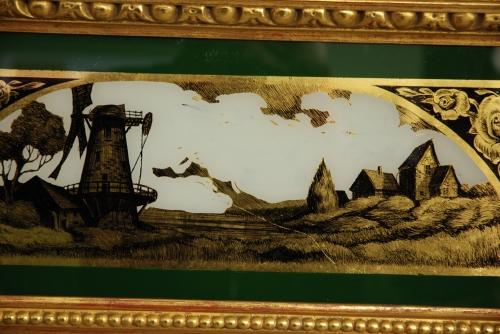 Regency style eglomise giltwood pier mirror