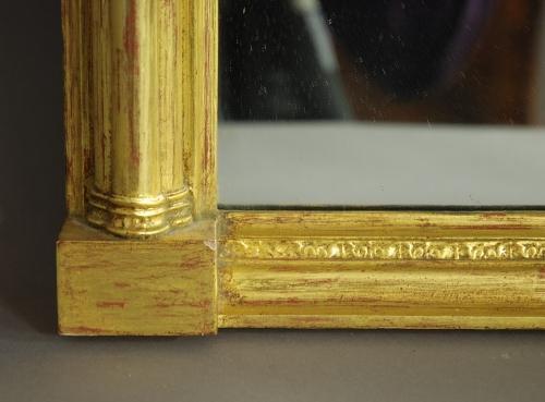 Regency style eglomise giltwood pier mirror