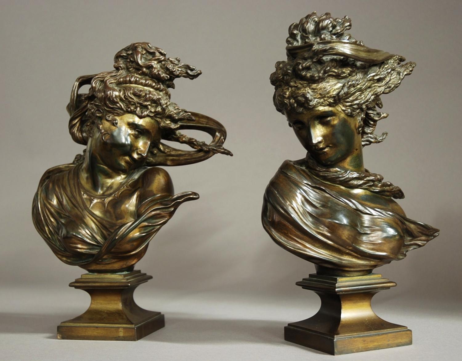Pair of bronzes of windswept young ladies