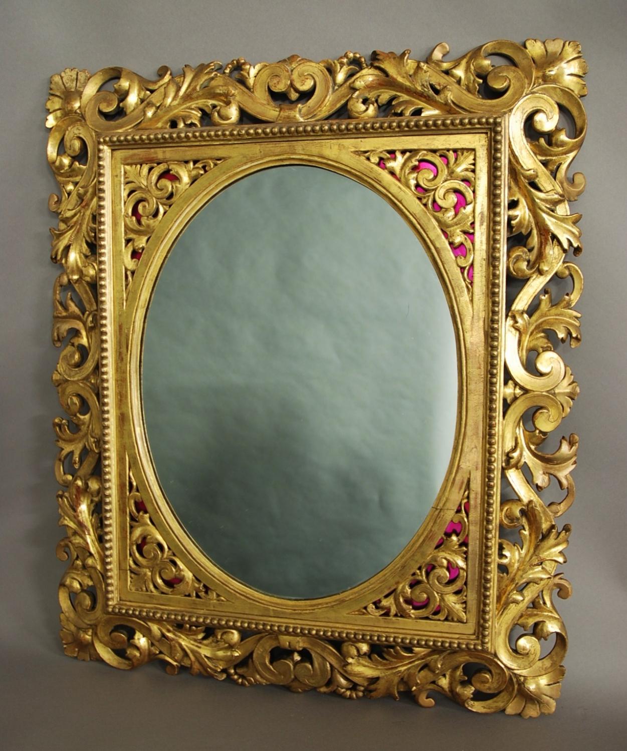 Florentine carved gilt wood mirror