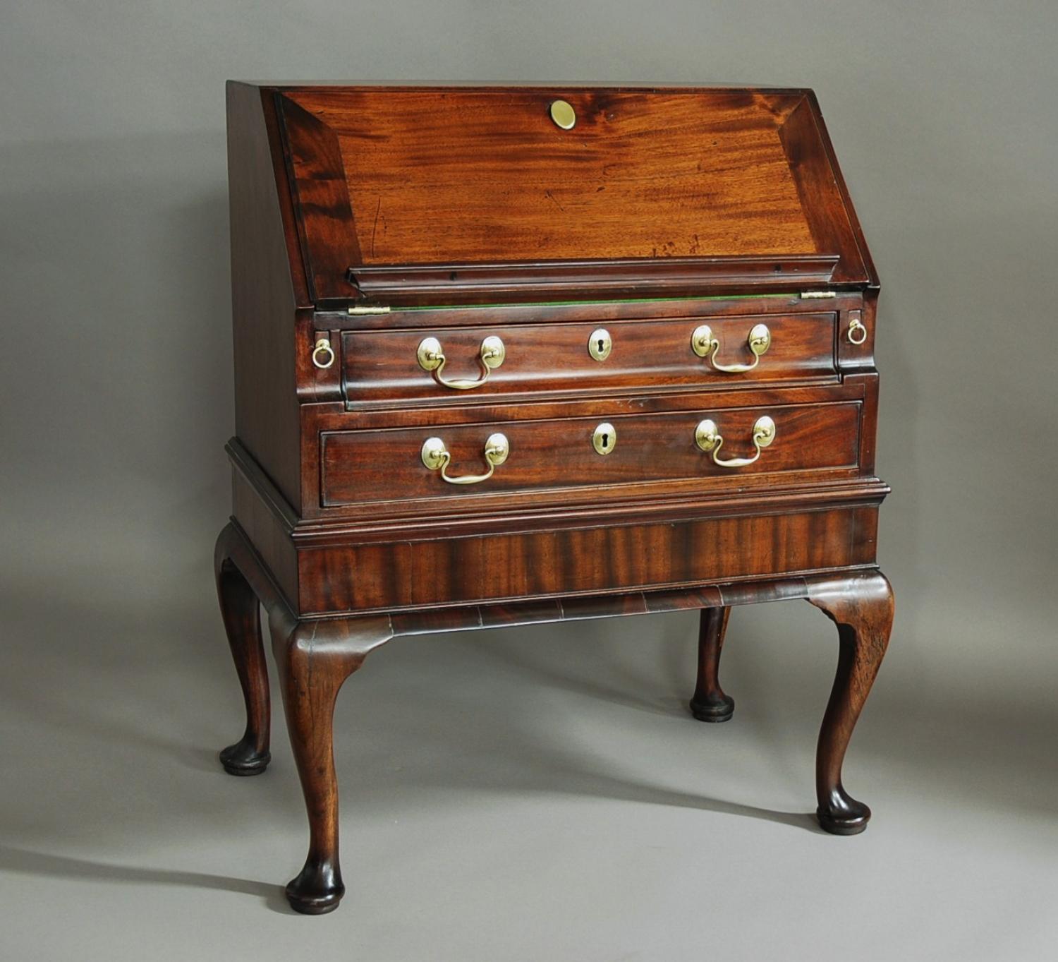 Elegant mid 18th century mahogany bureau on stand of small proportions
