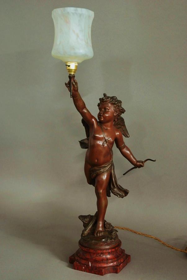 Late 19th century decorative French spelter table lamp of Cupid