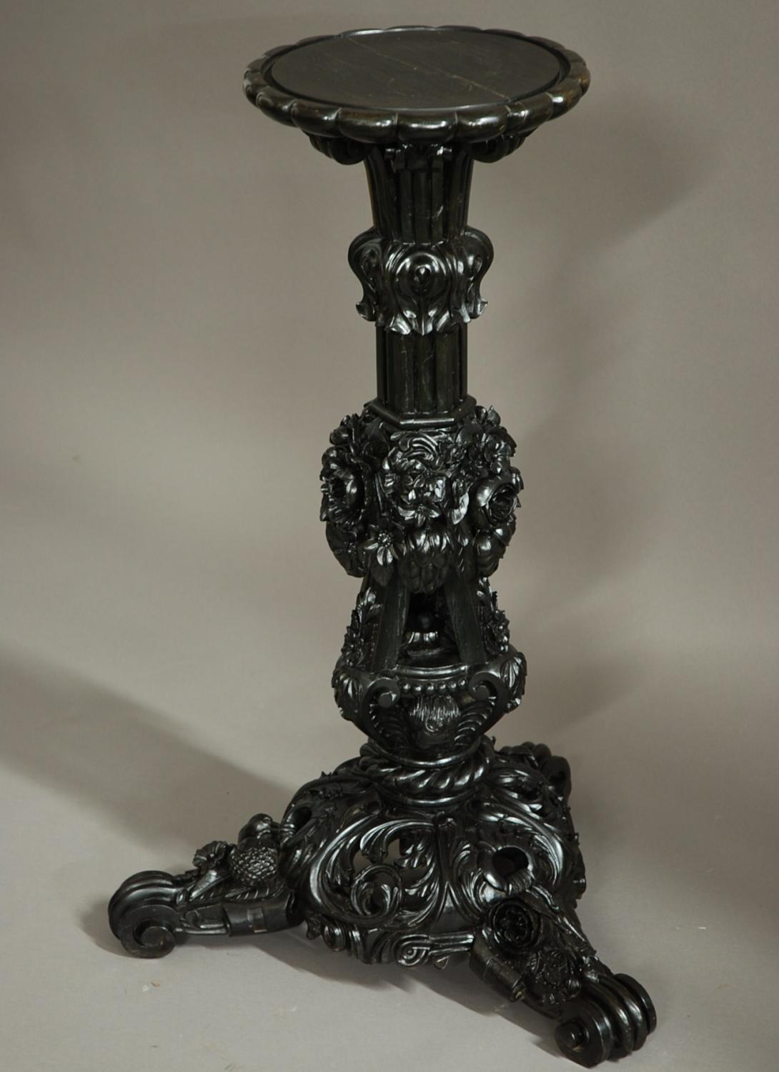 A superb quality Ceylonese carved ebony stand