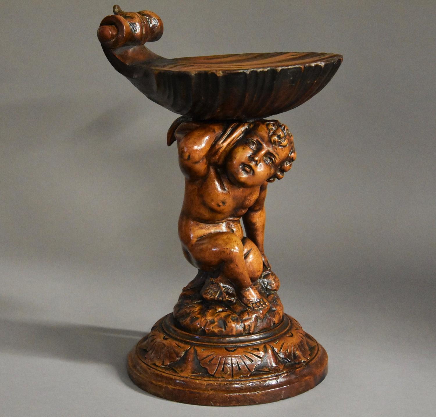 Highly decorative late 19thc Venetian pine putto Grotto stool