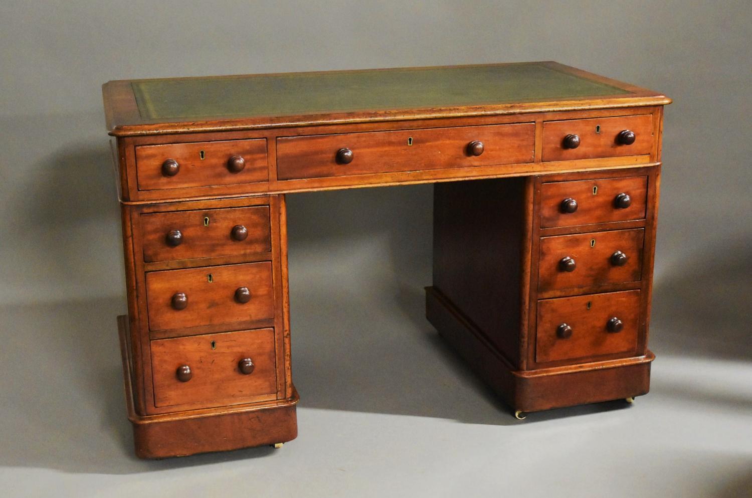 Late 19thc small mahogany pedestal desk