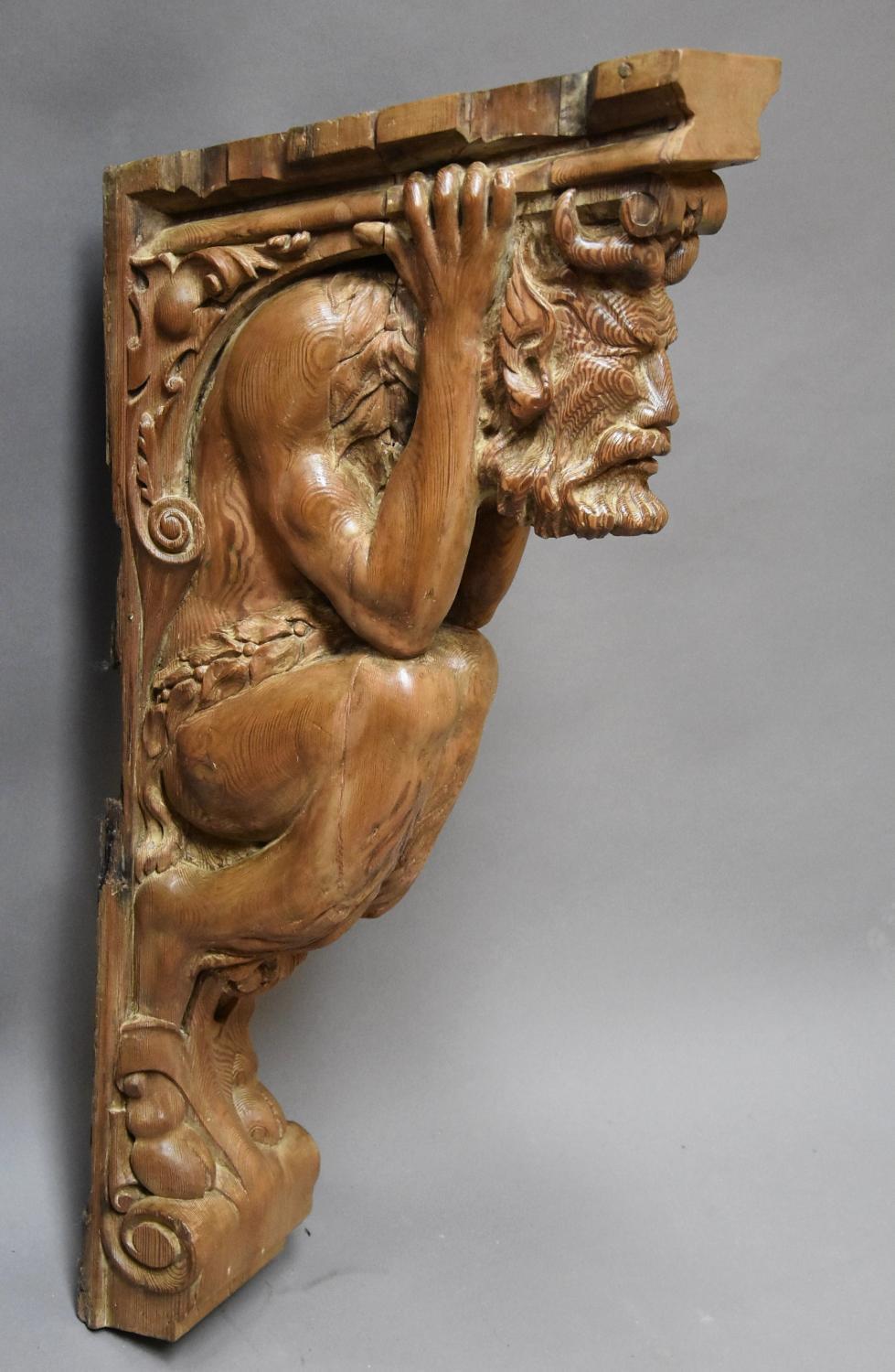 Large superbly carved 19thc pine satyr bracket