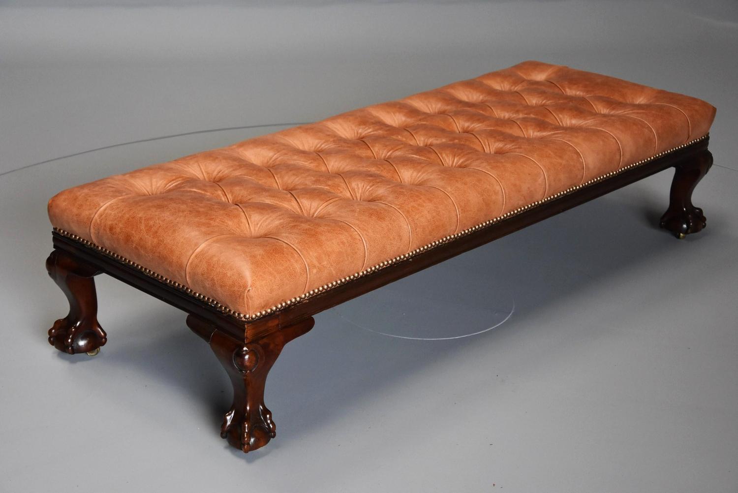 Large 19th century deep buttoned leather mahogany low stool