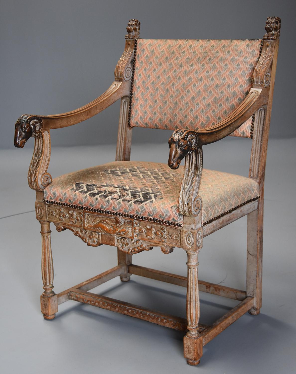 19thc highly decorative Renaissance style French limed oak armchair