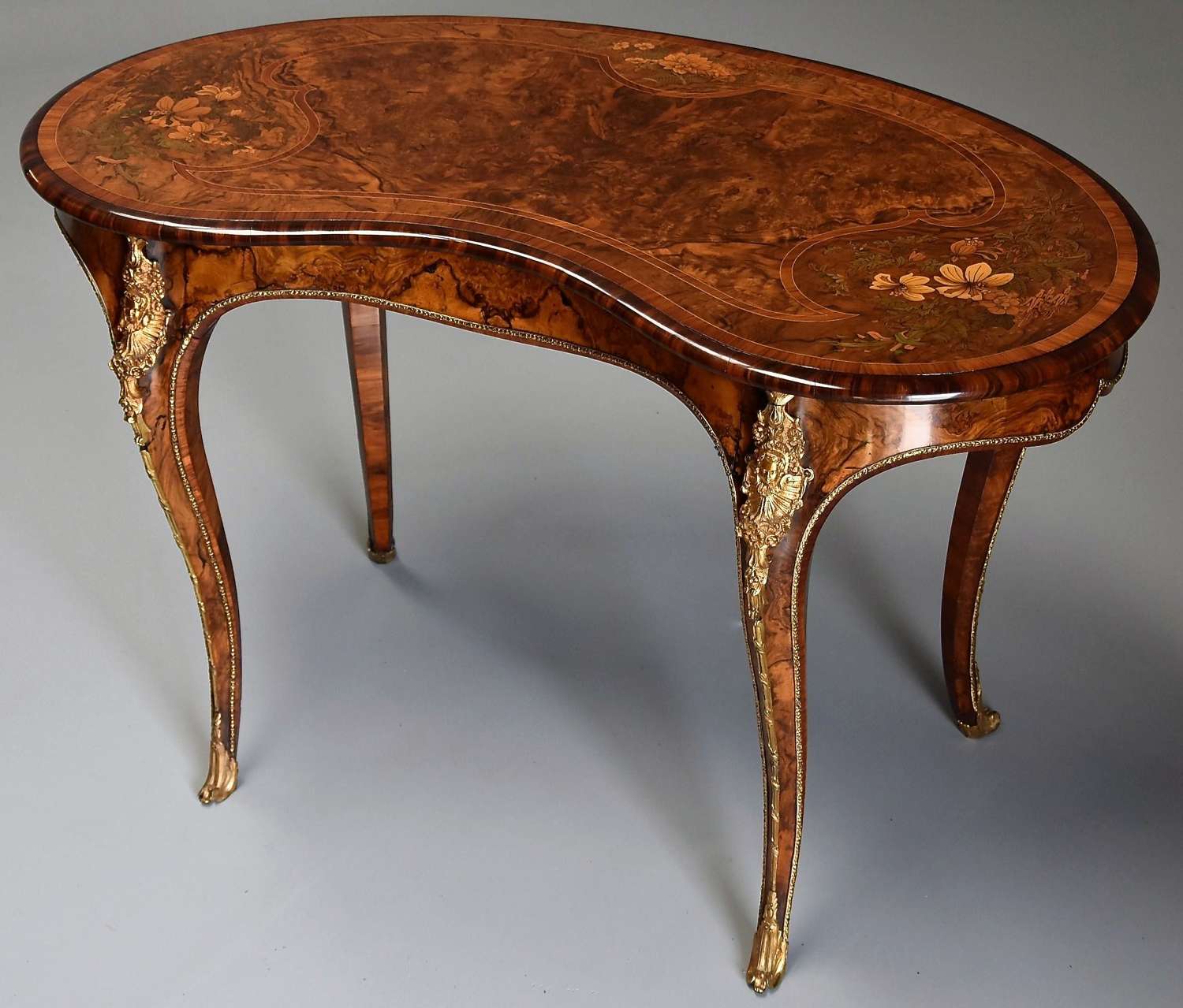 Superb 19thc walnut & marquetry kidney table in the manner of Gillows