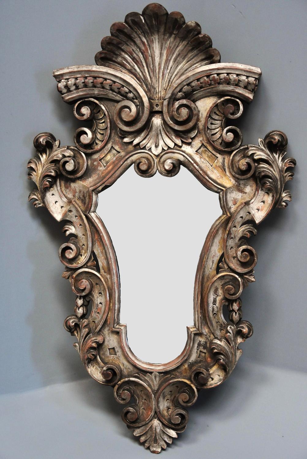 Highly decorative 19thc Italian silver giltwood Rococo style mirror
