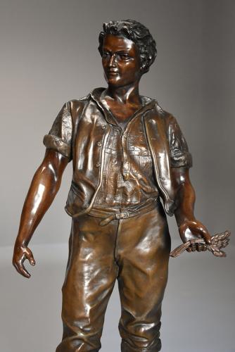 19thc large bronzed spelter figure of a farm labourer, signed Milliot