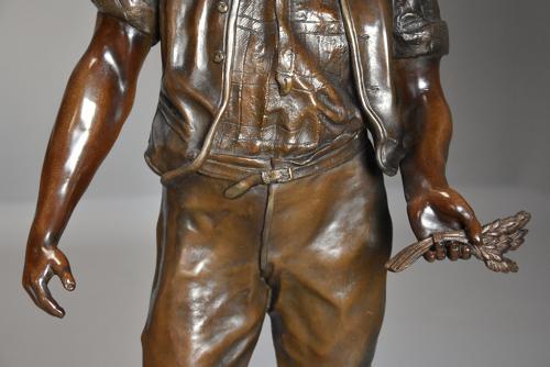 19thc large bronzed spelter figure of a farm labourer, signed Milliot