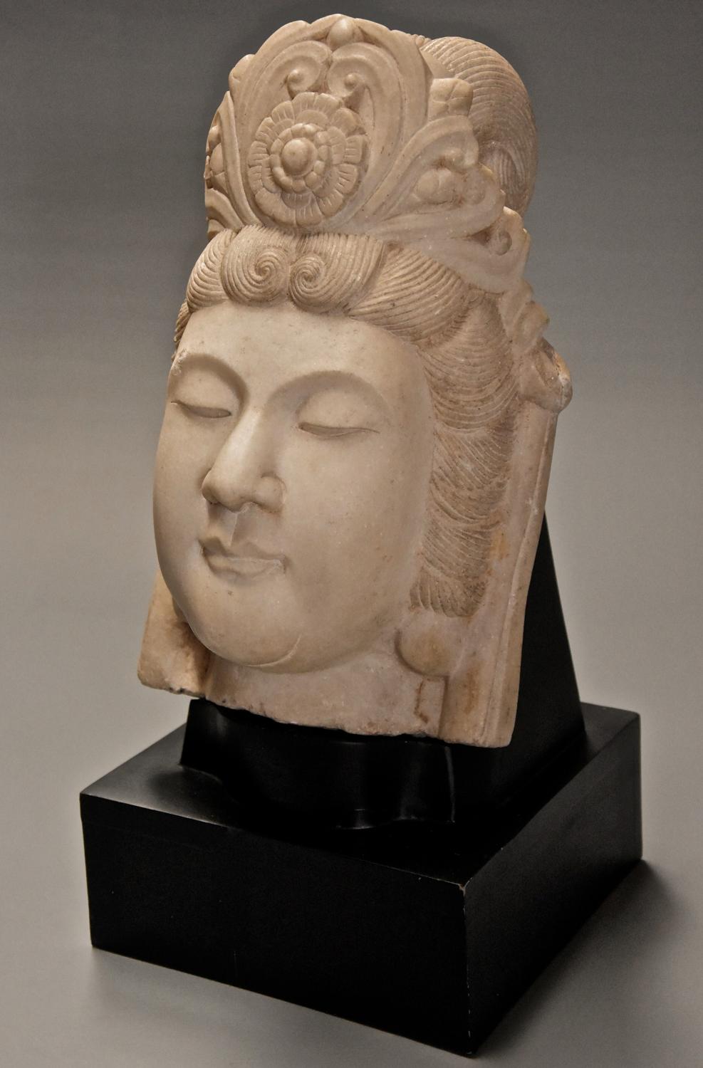 Late 19thc highly decorative carved marble head of Guan Yin