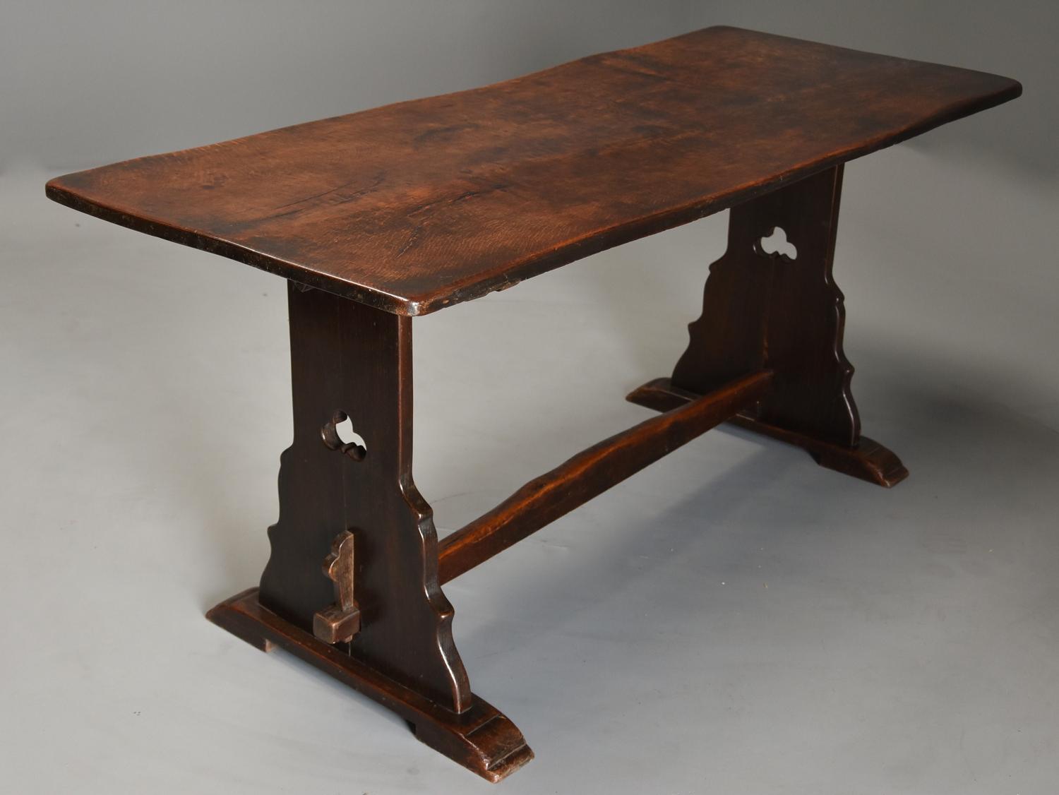 Early 20thc Arts & Crafts oak pegged trestle table with superb patina