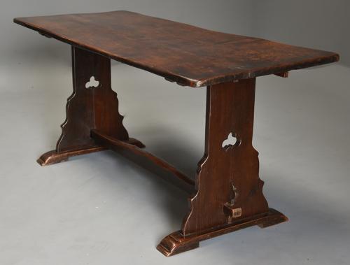 Early 20thc Arts & Crafts oak pegged trestle table with superb patina