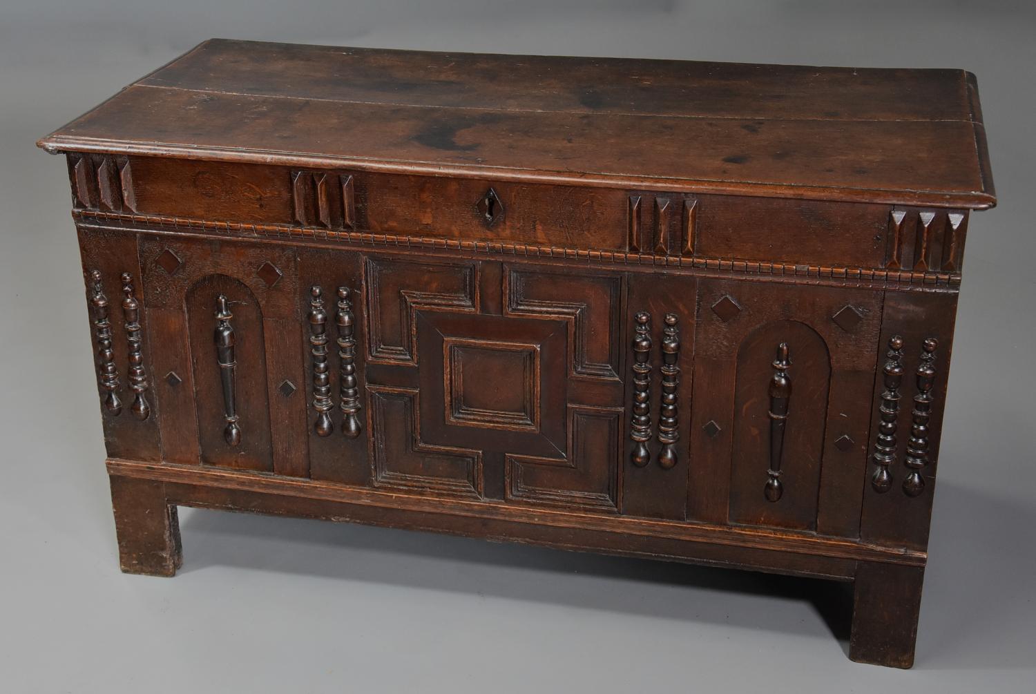 Rare mid-late 17th century oak moulded front coffer with fine patina