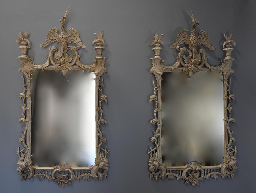 Pair of highly decorative Chippendale style carved wooden pier mirrors