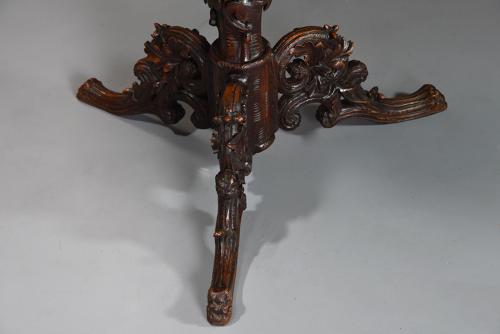 Late 19thc Black Forest carved linden wood centre table
