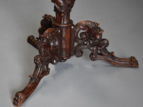 Late 19thc Black Forest carved linden wood centre table